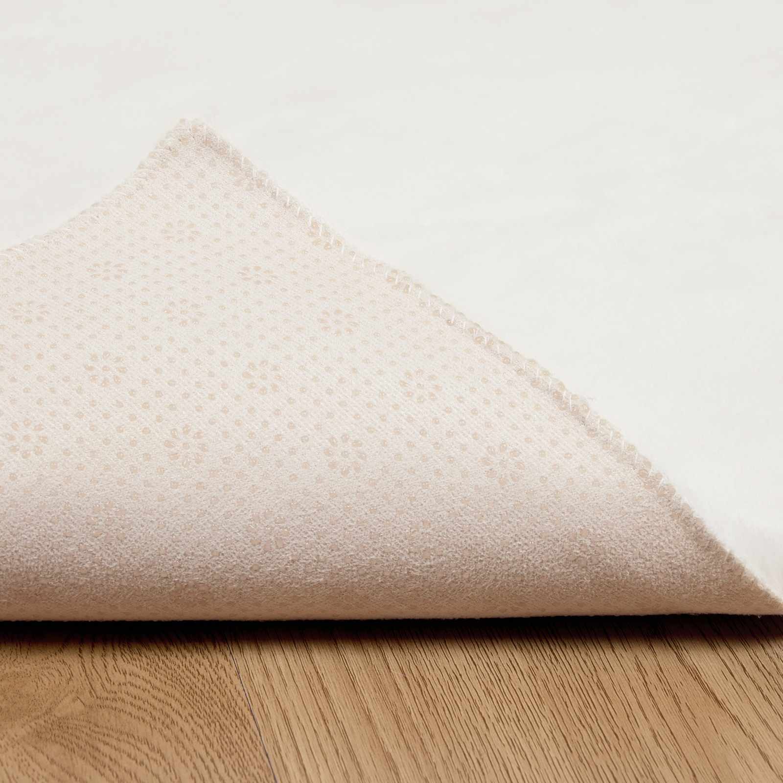 Tappeto antiscivolo in sintetica di coniglio OLITE Crema