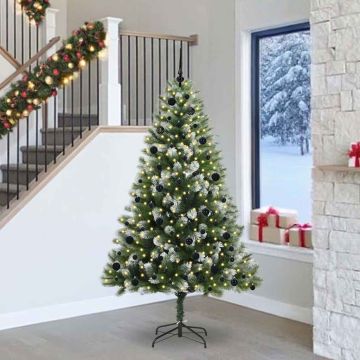 Albero di Natale artificiale con rami snodati e neve imbiancata